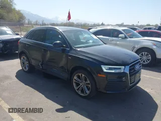 2018 Audi Q3 Premium Plus z VIN WA1JCCFS5JR034268, wystawiony jako IAAI lot #42011117 z przebiegiem 115 050 mil mil oraz . Historia ofert i sprzedaży dostępna na DreamBid. Obrazek 1.