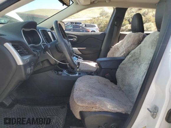 2018 Jeep Cherokee Trailhawk with VIN 1C4PJMBB5JD512333, listed as a Copart auction lot 61485865 with 83,223 mi miles and Salvage title. Bid and sale history available at DreamBid. Image 7.
