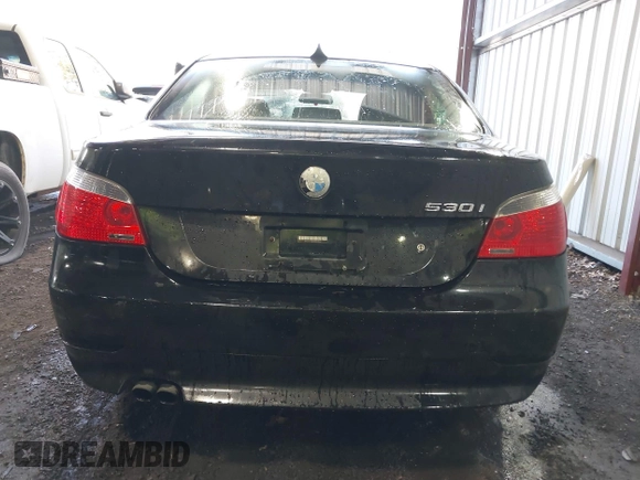 2005 BMW 5 Series 530i with VIN WBANA73545B049083, listed as a IAAI auction lot 41687711 with 206,013 mi miles. Bid and sale history available at carsss.com. Image 16.