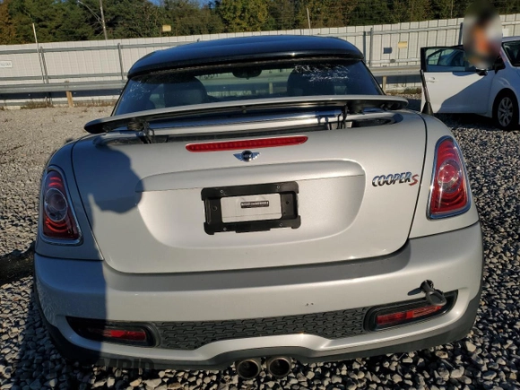 2013 MINI Coupe S z VIN WMWSX3C56DT466756, wystawiony jako Copart lot #80542054 z przebiegiem 95 135 mil mil oraz Szkoda całkowita • Salvage title. Historia ofert i sprzedaży dostępna na DreamBid. Obrazek 6.