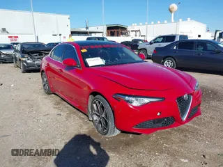 2019 Alfa Romeo Giulia Ti z VIN ZARFANBN9K7618754, wystawiony jako IAAI lot #41228113 z przebiegiem 73 437 mil mil oraz . Historia ofert i sprzedaży dostępna na DreamBid. Obrazek 1.