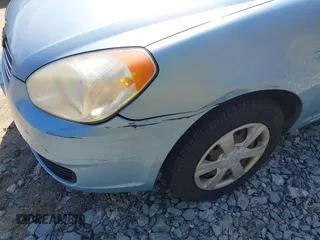 2007 Hyundai Accent GLS with VIN KMHCN46C57U159120, listed as a IAAI auction lot 42021811 with 114,564 mi miles. Bid and sale history available at carsss.com. Image 13.