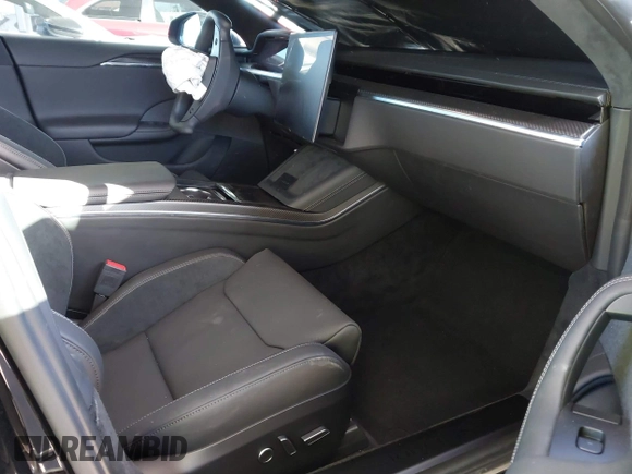 2023 Tesla Model S Plaid с VIN 5YJSA1E66PF518117, выставлен на аукционе IAAI как лот 41344515 с пробегом Не указан миль и . История ставок и продаж доступна на DreamBid. Изображение 5.