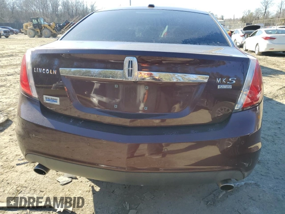 2012 Lincoln MKS with VIN 1LNHL9ER2CG802577, listed as a Copart auction lot 85455164 with 121,169 mi miles and Salvage Title. Bid and sale history available at DreamBid. Image 6.