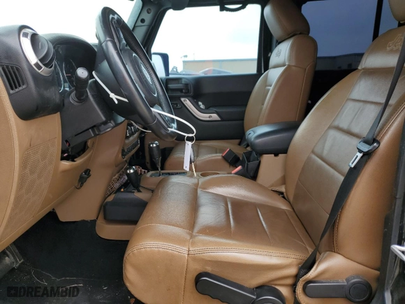 2011 Jeep Wrangler Unlimited Sahara with VIN 1J4HA5H13BL546703, listed as a Copart auction lot 51521845 with 127,132 mi miles and Salvage Title. Bid and sale history available at carsss.com. Image 7.