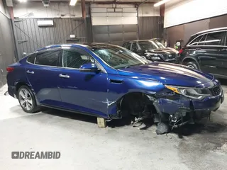 2019 Kia Optima LX z VIN 5XXGT4L37KG315026, wystawiony jako IAAI lot #42050820 z przebiegiem 148 579 mil mil oraz . Historia ofert i sprzedaży dostępna na DreamBid. Obrazek 14.