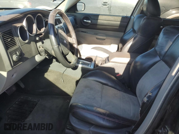 2006 Dodge Charger SRT-8 with VIN 2B3KA73W76H421802, listed as a Copart auction lot 83709404 with Not Provided miles and Salvage Title. Bid and sale history available at DreamBid. Image 7.