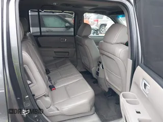 2012 Honda Pilot Touring with VIN 5FNYF4H98CB065003, listed as a IAAI auction lot 41989829 with 91,607 mi miles and . Bid and sale history available at DreamBid. Image 8.