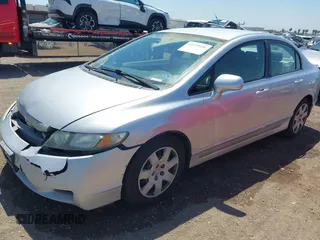 2010 Honda Civic LX with VIN 2HGFA1F50AH316349, listed as a IAAI auction lot 42229156 with 167,960 mi miles and . Bid and sale history available at DreamBid. Image 2.
