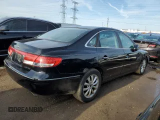 2007 Hyundai Azera SE z VIN KMHFC46F17A154947, wystawiony jako Copart lot #49224835 z przebiegiem 211 940 mil mil oraz Szkoda całkowita • Salvage title. Historia ofert i sprzedaży dostępna na DreamBid. Obrazek 3.