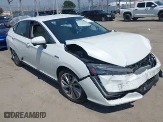 2018 Honda Clarity Plug-In Hybrid Touring with VIN JHMZC5F34JC010638, listed as a IAAI auction lot 41992548 with 51,106 mi miles. Bid and sale history available at carsss.com. Image 1.