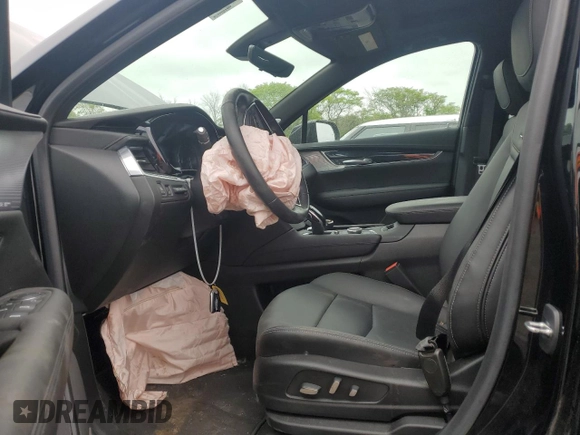 2023 Cadillac XT5 AWD Premium Luxury with VIN 1GYKNDR45PZ224937, listed as a Copart auction lot 57599125 with 12,905 mi miles and Salvage title. Bid and sale history available at DreamBid. Image 7.
