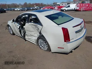 2011 Cadillac CTS Luxury with VIN 1G6DF5EY4B0114245, listed as a IAAI auction lot 42029416 with 83,473 mi miles and . Bid and sale history available at DreamBid. Image 3.
