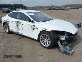 2016 Tesla Model S 70 kWh Battery with VIN 5YJSA1E15GF135841, listed as a IAAI auction lot 41846535 with 87,312 mi miles. Bid and sale history available at carsss.com. Image 1.