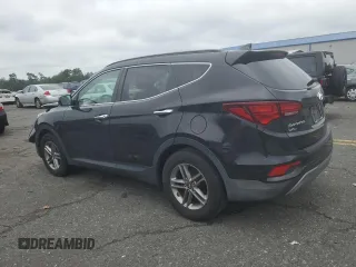 2017 Hyundai Santa Fe 2.4L with VIN 5NMZUDLB1HH028028, listed as a Copart auction lot 64431895 with Not provided miles and Salvage title. Bid and sale history available at DreamBid. Image 2.