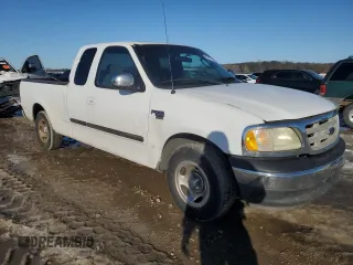 2002 Ford F-150 XL with VIN 1FTRX17L42KD35973, listed as a Copart auction lot 89121325 with 258,895 mi miles and Salvage title. Bid and sale history available at DreamBid. Image 4.