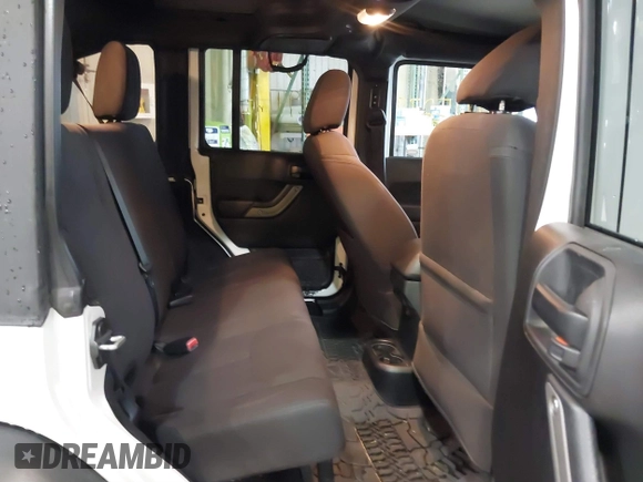 2018 Jeep Wrangler Unlimited Sport with VIN 1C4BJWDG8JL859885, listed as a IAAI auction lot 41205279 with 47,941 mi miles and . Bid and sale history available at DreamBid. Image 8.