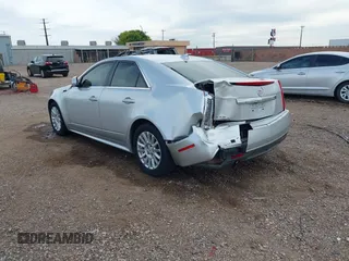 2013 Cadillac CTS Luxury with VIN 1G6DH5E58D0102036, listed as a IAAI auction lot 42270393 with 133,203 mi miles and . Bid and sale history available at DreamBid. Image 3.