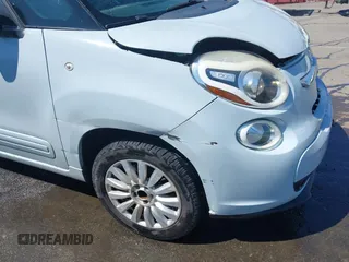 2015 FIAT 500L Easy with VIN ZFBCFABH8FZ031234, listed as a IAAI auction lot 41870102 with 86,267 mi miles and . Bid and sale history available at DreamBid. Image 17.