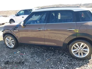 2014 MINI Countryman S with VIN WMWZC3C5XEWP52054, listed as a IAAI auction lot 41452354 with 104,873 mi miles and . Bid and sale history available at DreamBid. Image 15.