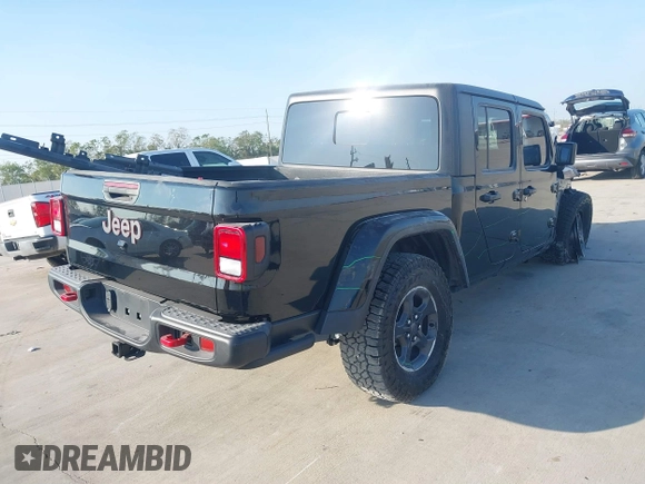 2023 Jeep Gladiator Rubicon z VIN 1C6JJTBGXPL543787, wystawiony jako IAAI lot #40963799 z przebiegiem 5 402 mil mil oraz . Historia ofert i sprzedaży dostępna na DreamBid. Obrazek 4.
