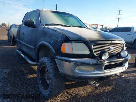 1997 Ford F-150 XL with VIN 1FTDX18W1VNB21383, listed as a IAAI auction lot 41378608 with 155,453 mi miles. Bid and sale history available at carsss.com. Image 1.