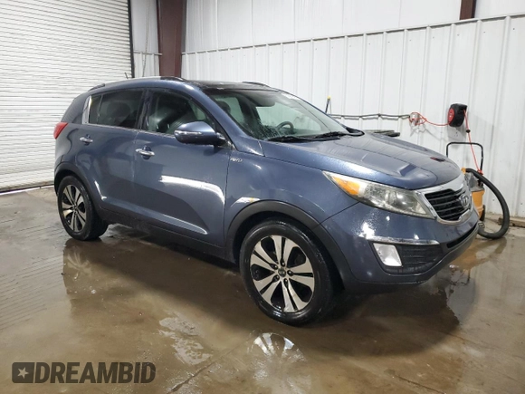 2011 Kia Sportage EX with VIN KNDPCCA22B7041389, listed as a Copart auction lot 60989105 with 98,542 mi miles and Salvage title. Bid and sale history available at DreamBid. Image 4.
