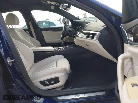 2019 BMW 5 Series 530e iPerformance with VIN WBAJA9C52KB398782, listed as a IAAI auction lot 41902660 with 37,857 mi miles. Bid and sale history available at carsss.com. Image 5.