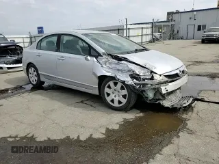 2011 Honda Civic LX with VIN 2HGFA1F59BH309708, listed as a Copart auction lot 53485515 with 215,954 mi miles and Salvage Title. Bid and sale history available at DreamBid. Image 11.
