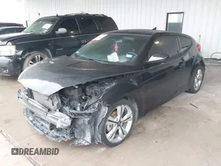 2017 Hyundai Veloster Value Edition with VIN KMHTC6AD6HU321999, listed as a IAAI auction lot 41611017 with 99,382 mi miles. Bid and sale history available at carsss.com. Image 2.