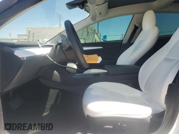 2023 Tesla Model 3 z VIN 5YJ3E1EA7PF549633, wystawiony jako Copart lot #57131325 z przebiegiem 78 113 mil mil oraz Szkoda całkowita • Salvage title. Historia ofert i sprzedaży dostępna na DreamBid. Obrazek 7.