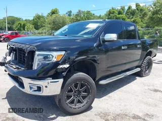 2018 Nissan Titan SV with VIN 1N6AA1E60JN511357, listed as a IAAI auction lot 42582405 with 110,043 mi miles and . Bid and sale history available at DreamBid. Image 2.