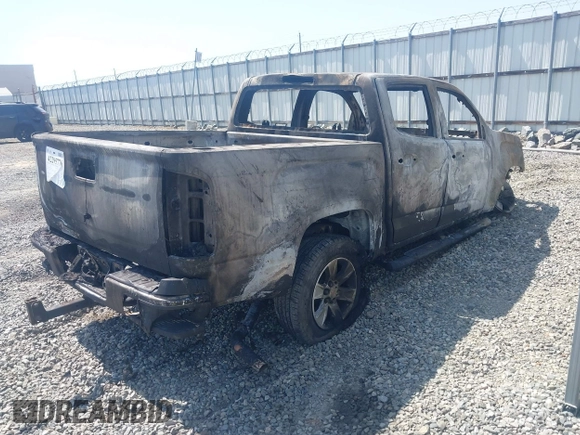 2018 GMC Canyon 2WD SLE z VIN 1GTG5CEN2J1280716, wystawiony jako IAAI lot #42295776 z przebiegiem Nie podano mil oraz . Historia ofert i sprzedaży dostępna na DreamBid. Obrazek 4.
