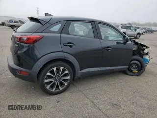2019 Mazda CX-3 Touring with VIN JM1DKFC71K0424748, listed as a Copart auction lot 51145325 with 89,500 mi miles and Salvage Title. Bid and sale history available at DreamBid. Image 3.