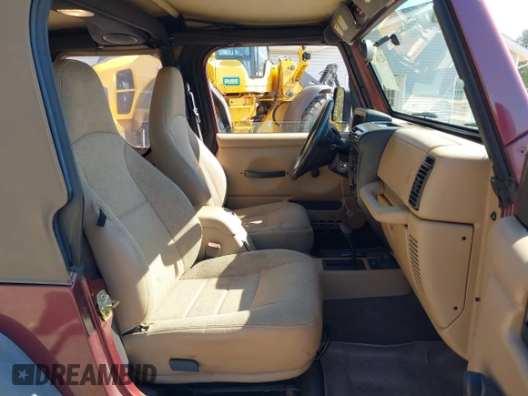2002 Jeep Wrangler Sport with VIN 1J4FA49SX2P713303, listed as a IAAI auction lot 42136848 with 152,822 mi miles. Bid and sale history available at carsss.com. Image 5.
