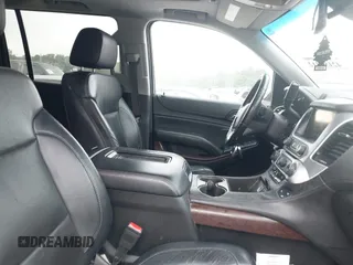 2015 GMC Yukon XL SLT with VIN 1GKS1HKC2FR251672, listed as a IAAI auction lot 42152312 with 232,736 mi miles and . Bid and sale history available at carsss.com. Image 5.