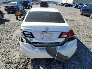 2015 Honda Civic LX with VIN 19XFB2F56FE119187, listed as a Copart auction lot 49957975 with 104,792 mi miles and Salvage Title. Bid and sale history available at DreamBid. Image 6.