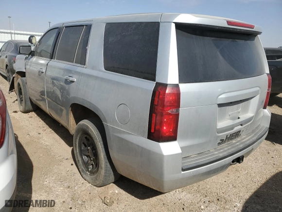 2019 Chevrolet Tahoe Commercial with VIN 1GNLCDEC9KR172936, listed as a Copart auction lot 68144714 with 129,325 mi miles and Salvage Title. Bid and sale history available at carsss.com. Image 2.