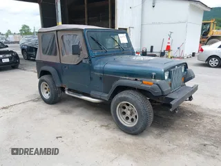 1995 Jeep Wrangler S z VIN 1J4FY19P1SP249453, wystawiony jako IAAI lot #42379722 z przebiegiem 160 066 mil mil oraz . Historia ofert i sprzedaży dostępna na DreamBid. Obrazek 1.