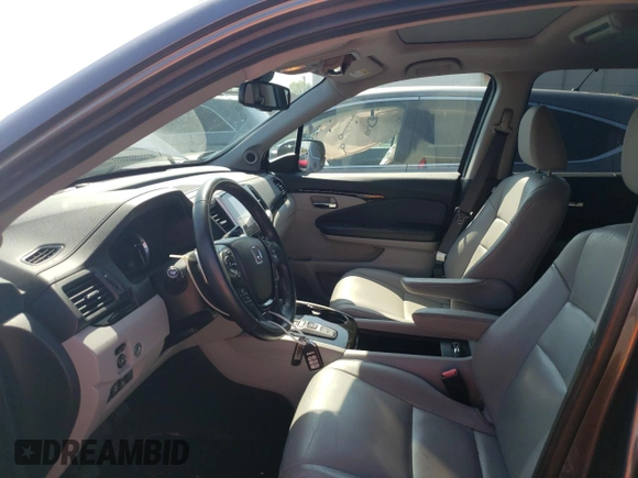 2017 Honda Pilot Touring with VIN 5FNYF6H9XHB023385, listed as a Copart auction lot 55482975 with 105,039 mi miles and Salvage Title. Bid and sale history available at carsss.com. Image 7.