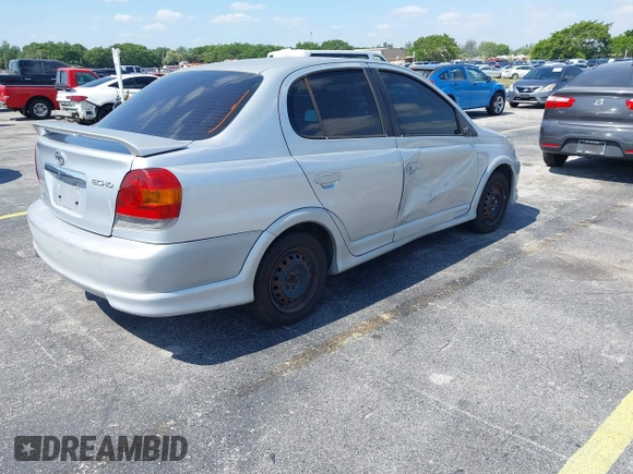 2003 Toyota ECHO with VIN JTDBT123935047533, listed as a IAAI auction lot 42143695 with 170,911 mi miles. Bid and sale history available at carsss.com. Image 4.