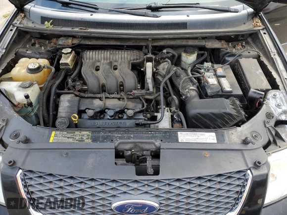 2006 Ford Freestyle SEL z VIN 1FMDK05106GA49966, wystawiony jako Copart lot #69358494 z przebiegiem 125 462 mil mil oraz Czysty tytuł • Clean title. Historia ofert i sprzedaży dostępna na DreamBid. Obrazek 12.