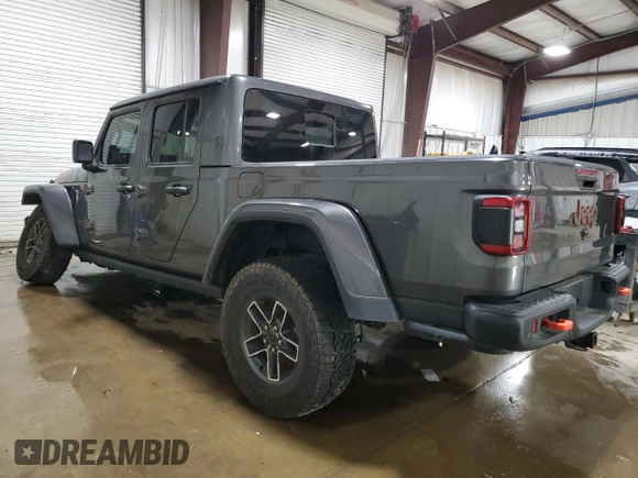 2024 Jeep Gladiator Mojave X with VIN 1C6JJTEG2RL106980, listed as a Copart auction lot 55142885 with 7,263 mi miles and Salvage title. Bid and sale history available at DreamBid. Image 2.