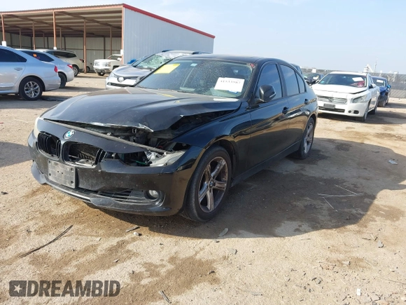 2013 BMW 3 Series 328i with VIN WBA3C1C51DF440679, listed as a IAAI auction lot 41533587 with 184,812 mi miles. Bid and sale history available at carsss.com. Image 2.