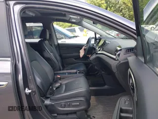 2022 Honda Odyssey Touring with VIN 5FNRL6H89NB008814, listed as a IAAI auction lot 42597738 with 49,933 mi miles and . Bid and sale history available at DreamBid. Image 5.