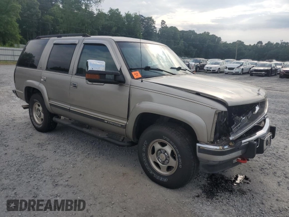 2000 Chevrolet Tahoe Z71 with VIN 1GNEK13R7YR189177, listed as a Copart auction lot 56830725 with 308,270 mi miles and Salvage title. Bid and sale history available at DreamBid. Image 4.