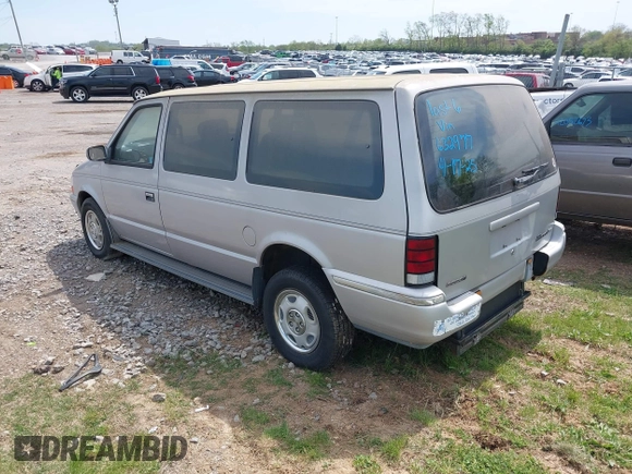 1991 Dodge Grand Caravan with VIN 1B4GK54R6MX632977, listed as a IAAI auction lot 42063934 with 130,812 mi miles and . Bid and sale history available at DreamBid. Image 3.