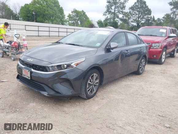 2023 Kia Forte LXS with VIN 3KPF24AD3PE566815, listed as a IAAI auction lot 41922482 with 20,790 mi miles and . Bid and sale history available at DreamBid. Image 2.