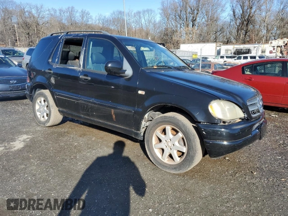 2001 Mercedes-Benz M 320/430/500 with VIN 4JGAB72EX1A277472, listed as a Copart auction lot 86857214 with Not provided miles and Salvage title. Bid and sale history available at DreamBid. Image 4.