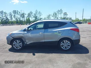 2013 Hyundai Tucson GLS with VIN KM8JU3AC4DU588062, listed as a IAAI auction lot 42080348 with 76,937 mi miles. Bid and sale history available at carsss.com. Image 14.